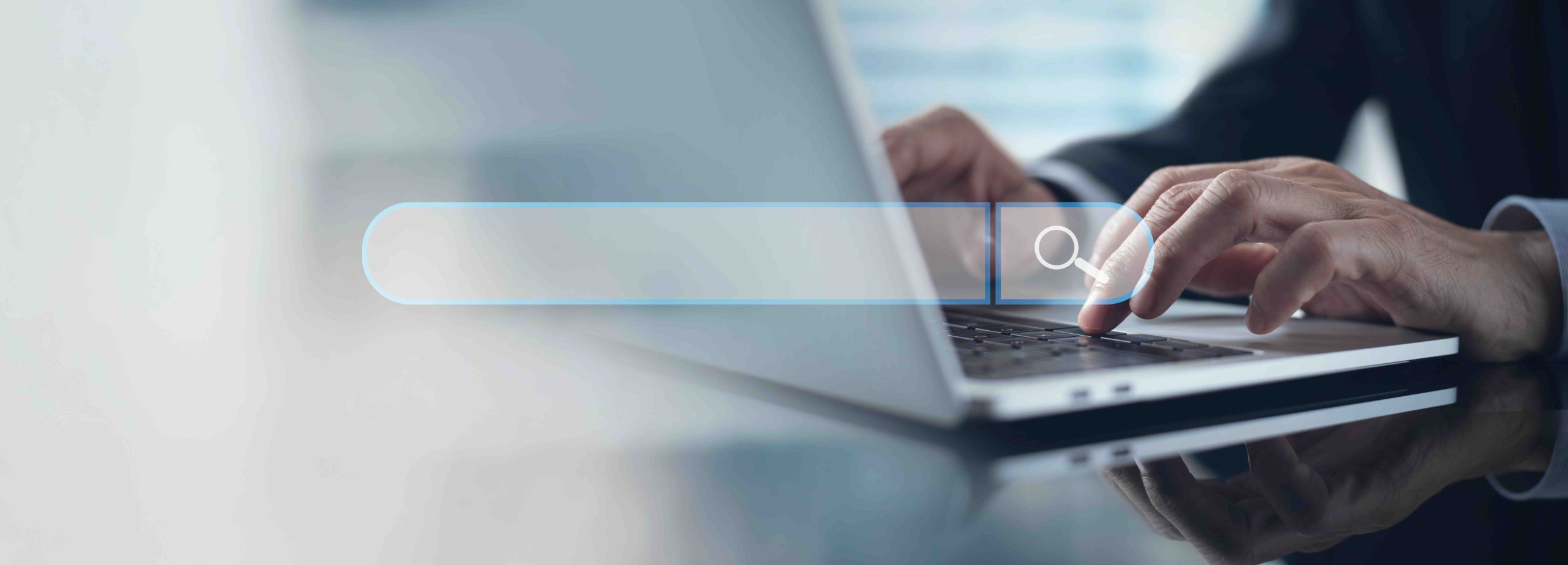 Search Engine Optimization SEO, data searching technology. Man's hands typing on laptop computer to search the information via internet web browser A man searching for a house on a computer - The Process of Buying a House